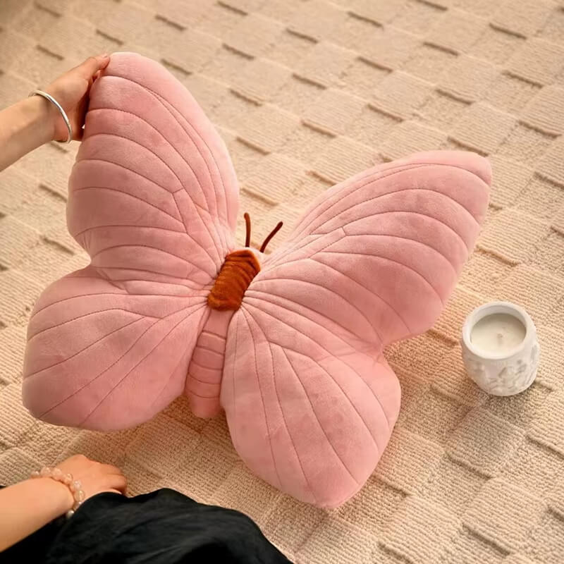 Almofada Decorativa em Veludo - Formato Borboleta em azul elegante, ideal para decorações sofisticadas.