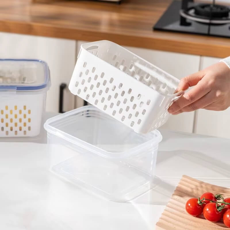 Caixa de Preservação Dupla Camada que otimiza o frescor e a organização de frutas e vegetais na sua geladeira.