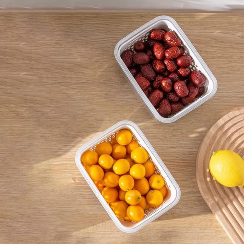 Caixa de Preservação Dupla Camada para frutas e vegetais, mantendo os alimentos frescos e organizados na geladeira.