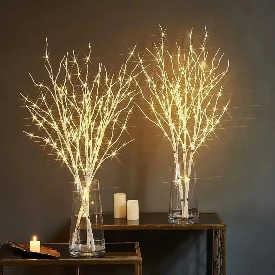 Visão geral do galho decorativo com 20 LEDs de luz branca morna, ideal para criar um ambiente romântico e acolhedor em festas e decorações.