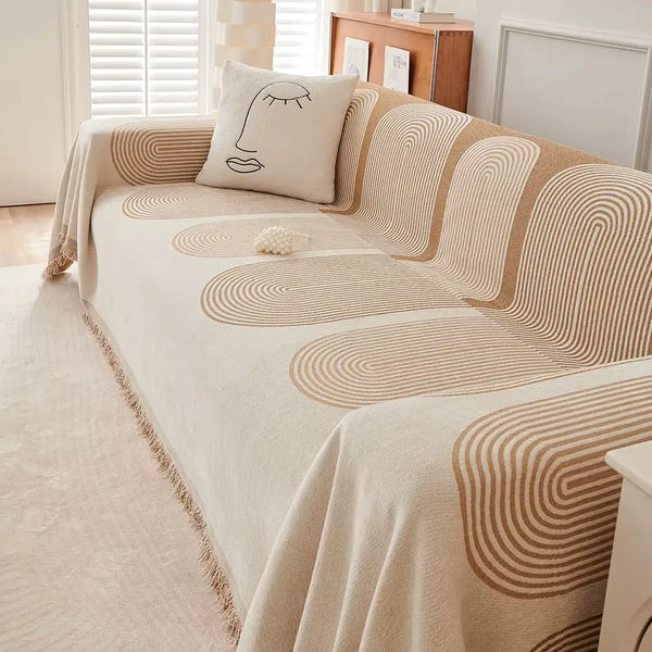 Manta de crochê decorativa com franjas, perfeita para criar um ambiente aconchegante.
